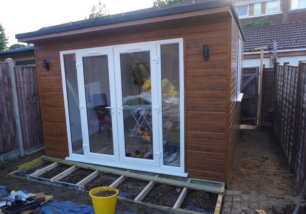 Decking frame under construction outside the French doors