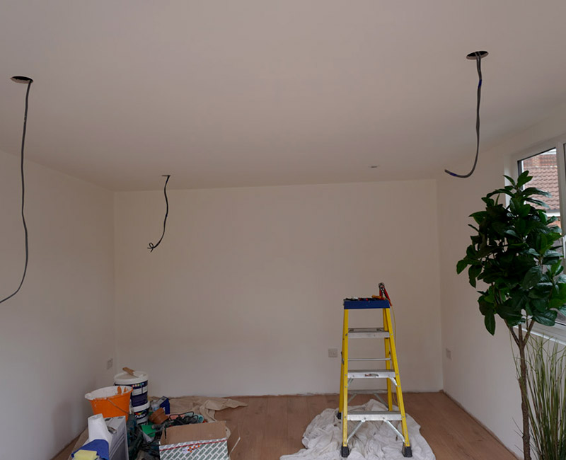 Plastered garden office interior with first-fix electrical cables