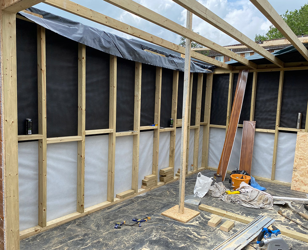 Timber wall frame and roof joists with breathable membrane