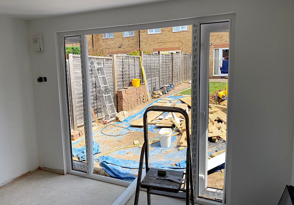 White French doors installed in the garden office