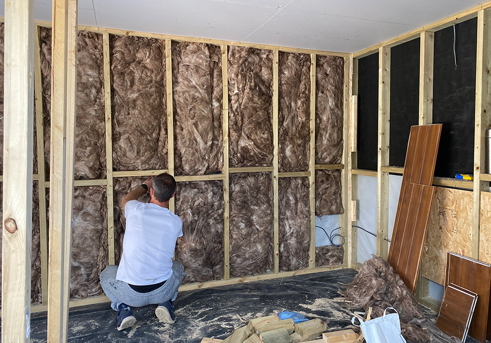 Insulation fitted between timber wall studs