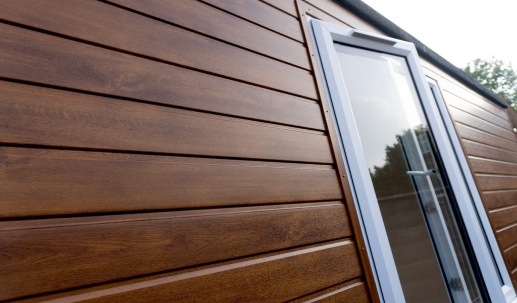 Opening window set into external timber cladding