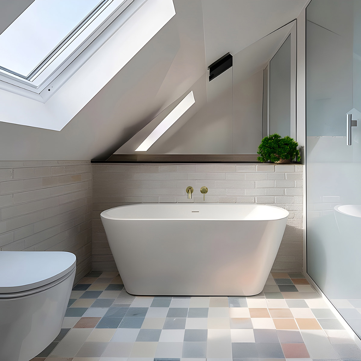 Freestanding bath beneath a sloping ceiling and roof window, beside a glass shower enclosure